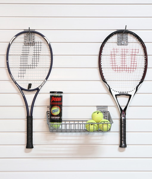 How does the small angle basket benefit tennis storage?