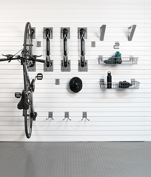 What is the maximum tire width that the Deluxe Bike Bundle can accommodate?