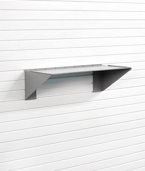 How does the shelf lock into place?